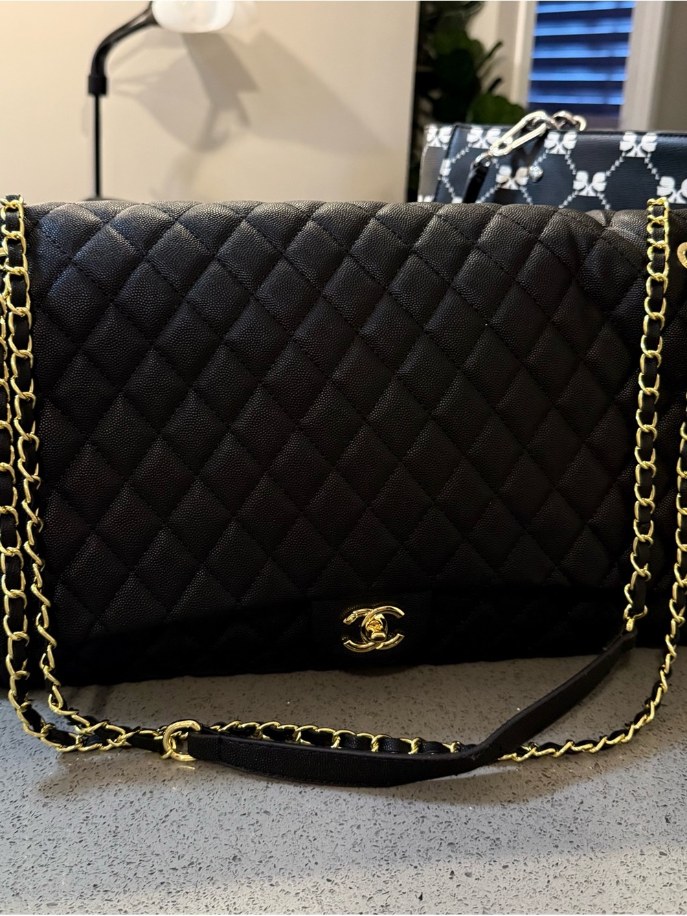 CHANEL Black Quilted Shoulder Bag with Gold Chain